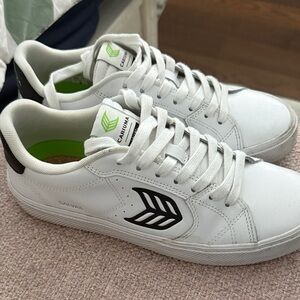 Cariuma White Sneakers with Black Details